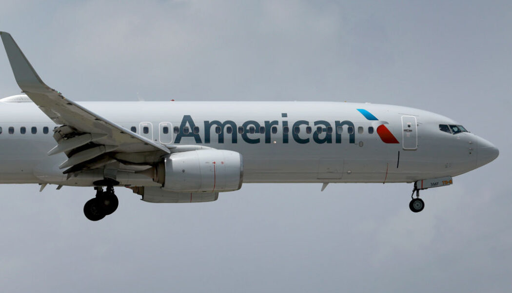 American Airlines cuts workers to improve customer assistance.